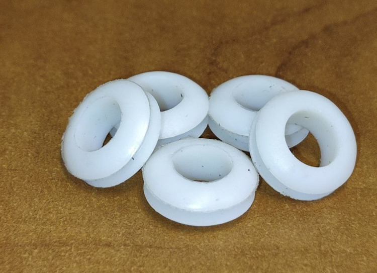 White industrial bushings